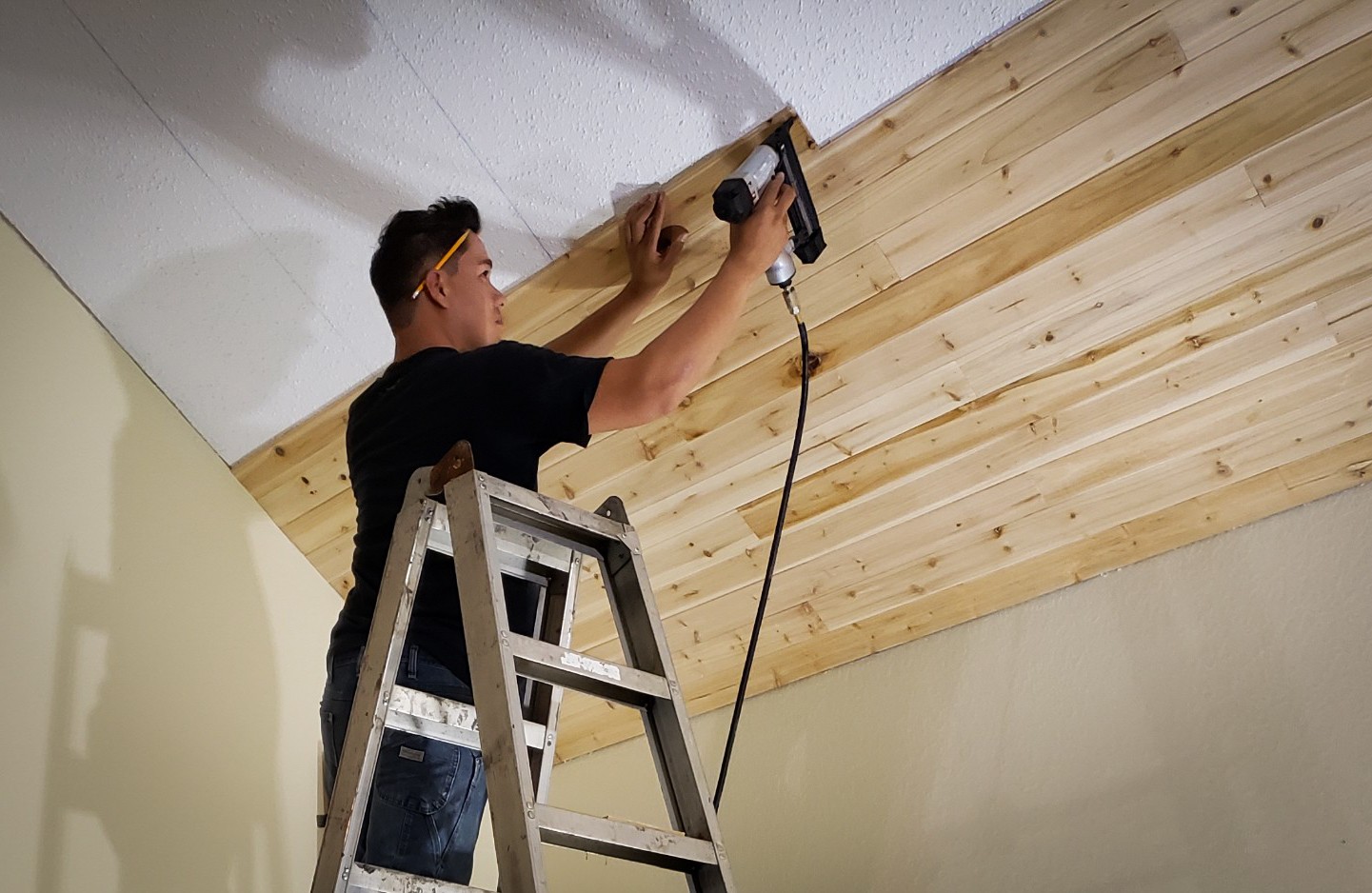 NorTex Founder Jasson Diaz has over 15 years experience in carpentry and remodelling. Here he installs a new wood panel ceiling. 